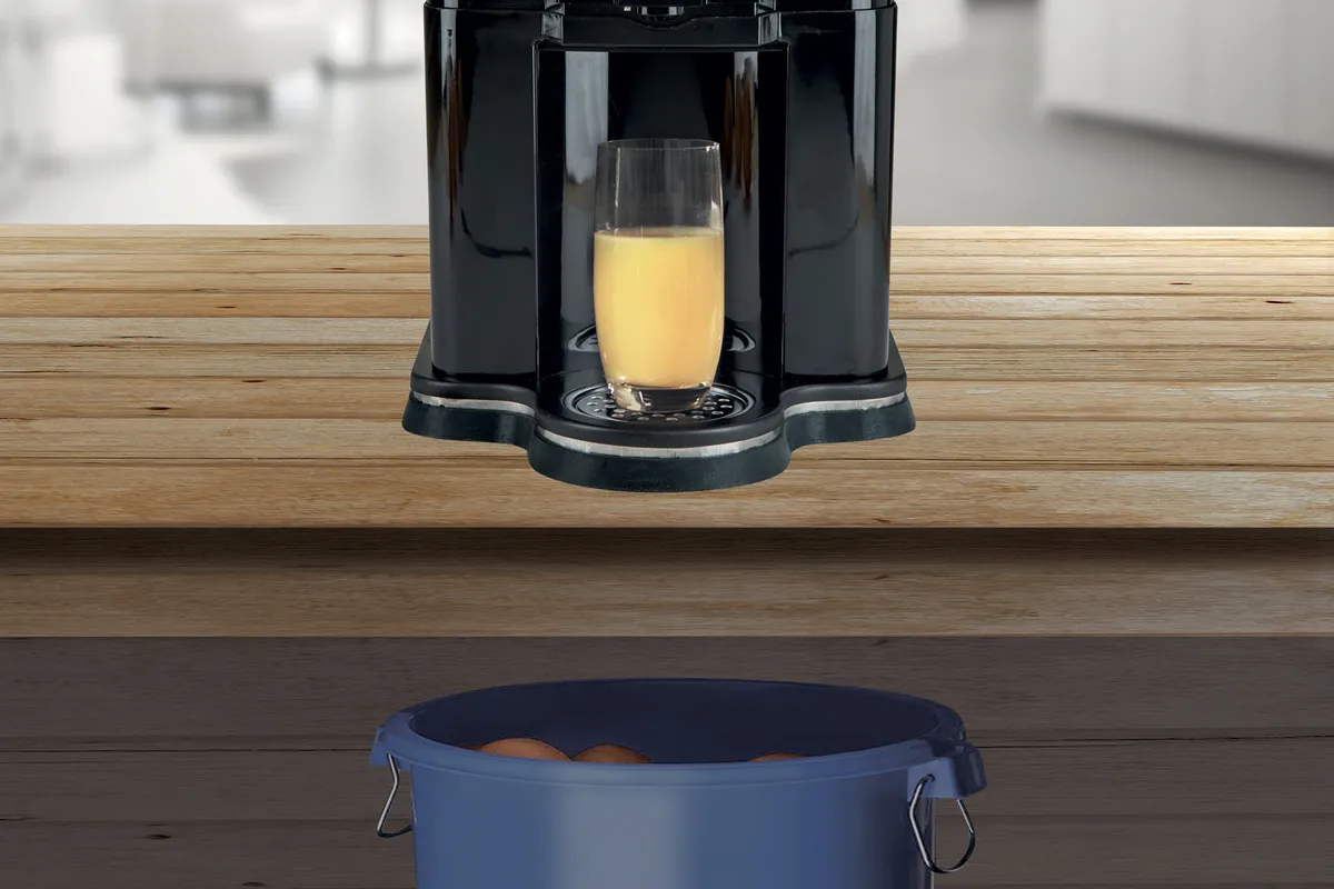 Verre de jus d’orange se remplissant sous l’OL 41 au comptoir